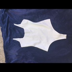 Never worn white bodysuit